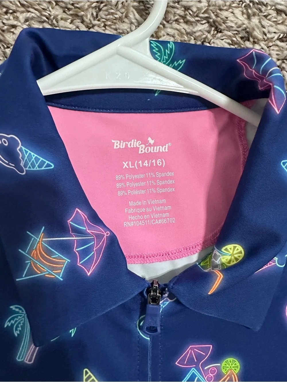 Birdie bound Girls' Navy Neon Print Sleeveless Polo romper